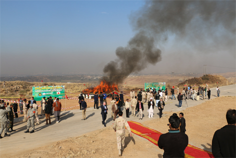 Anti-Narcotics Force burning prohibited goods and contraband drugs near Islamabad in 2016